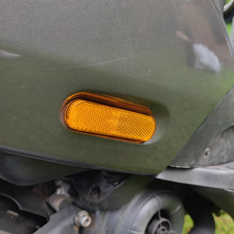 reflector piaggio zip oranje op kappenset