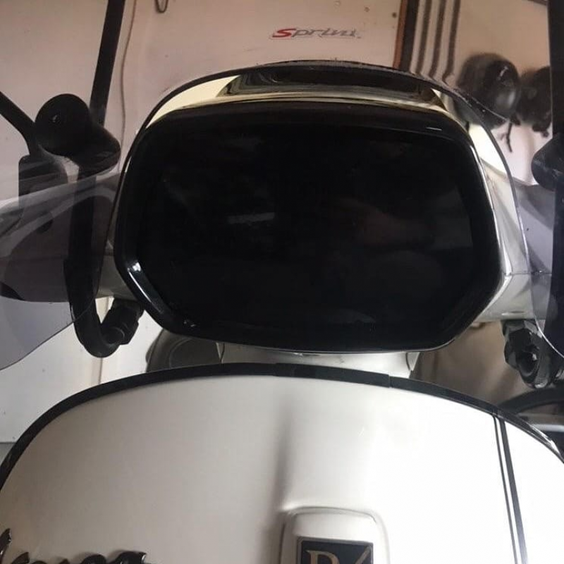 smokefolie op koplamp van vespa sprint 